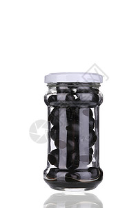 五香黑鸭腿黑橄榄在罐子里黑色宏观白色小吃蔬菜美食杂货罐装玻璃产品背景