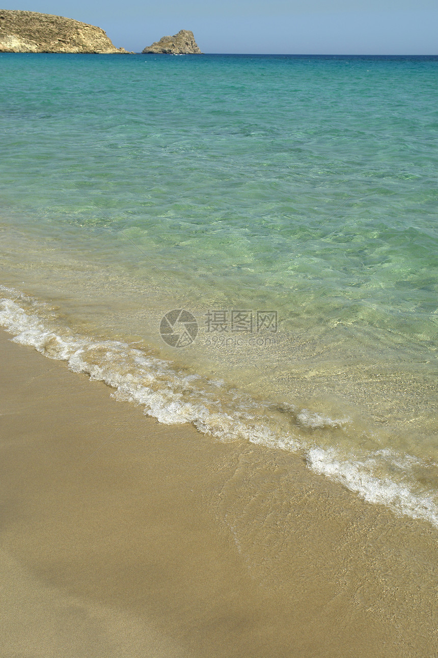 海滩沙滩旅行海浪天空蓝色海洋岩石风景海岸晴天绿色图片