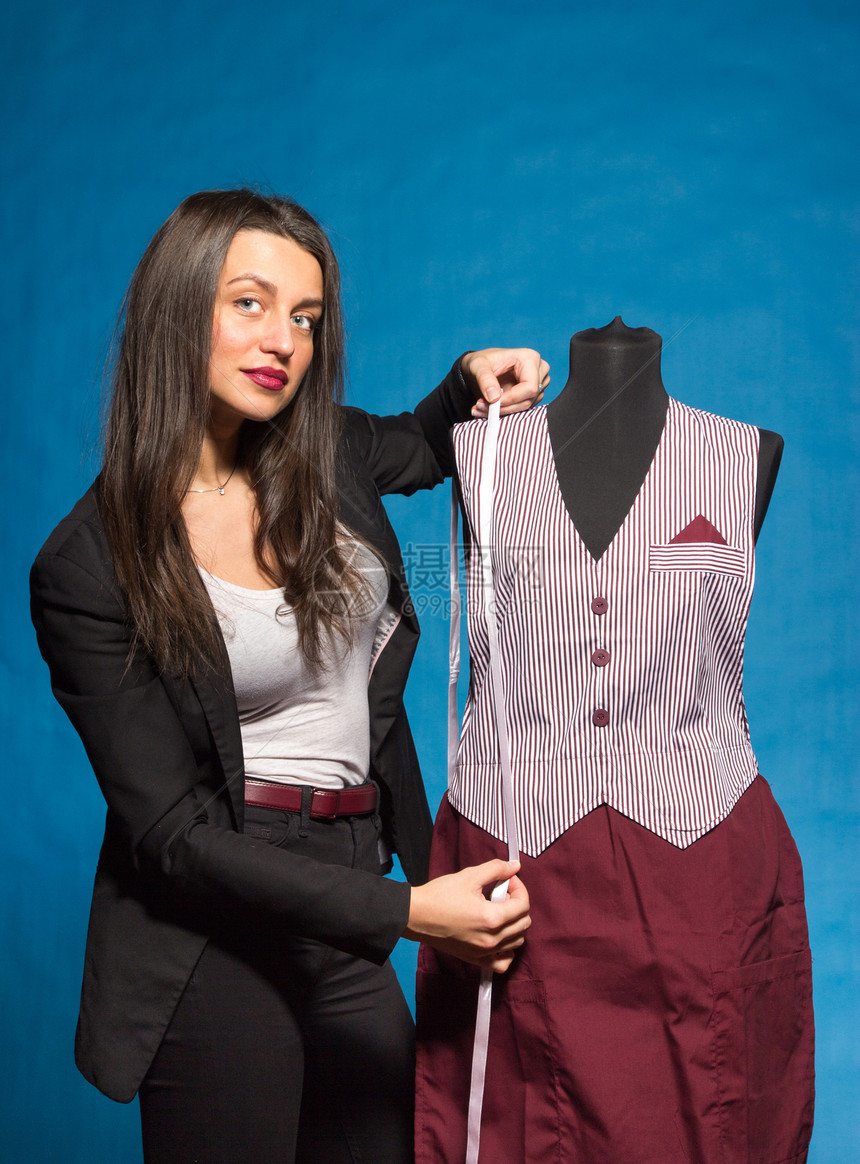 年轻裁缝装扮假人模型纺织品厘米数字衣服缝纫工作商业女士裙子图片