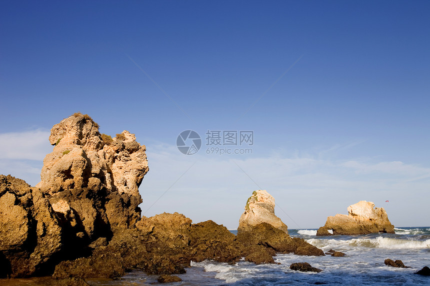 海滩沙滩娱乐反射海洋蓝色海岸旅行环境巨石水库地标图片