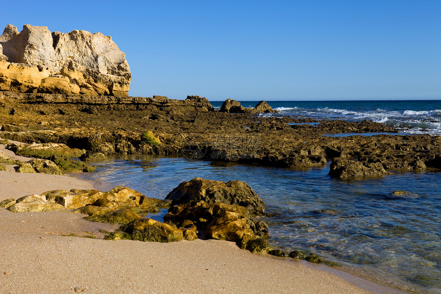 海滩沙滩悬崖海洋岩石海岸砂岩娱乐环境场景水库蓝色图片