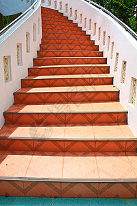 平铺楼梯白色工匠熟练工工艺红色建筑脚步背景图片