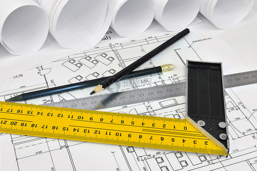建筑设计师的绘画和工具铅笔建筑工程草稿房子工程师桌面卷轴文档打印图片