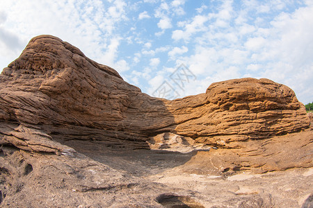 萨姆潘博克热带沙漠鸿沟河岸沟壑场景天空火山石头蓝色背景