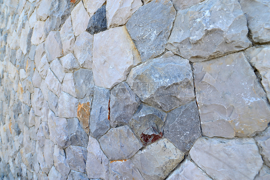 巨石墙鹅卵石壁板建筑围墙花岗岩石墙结构建材建造纹理图片