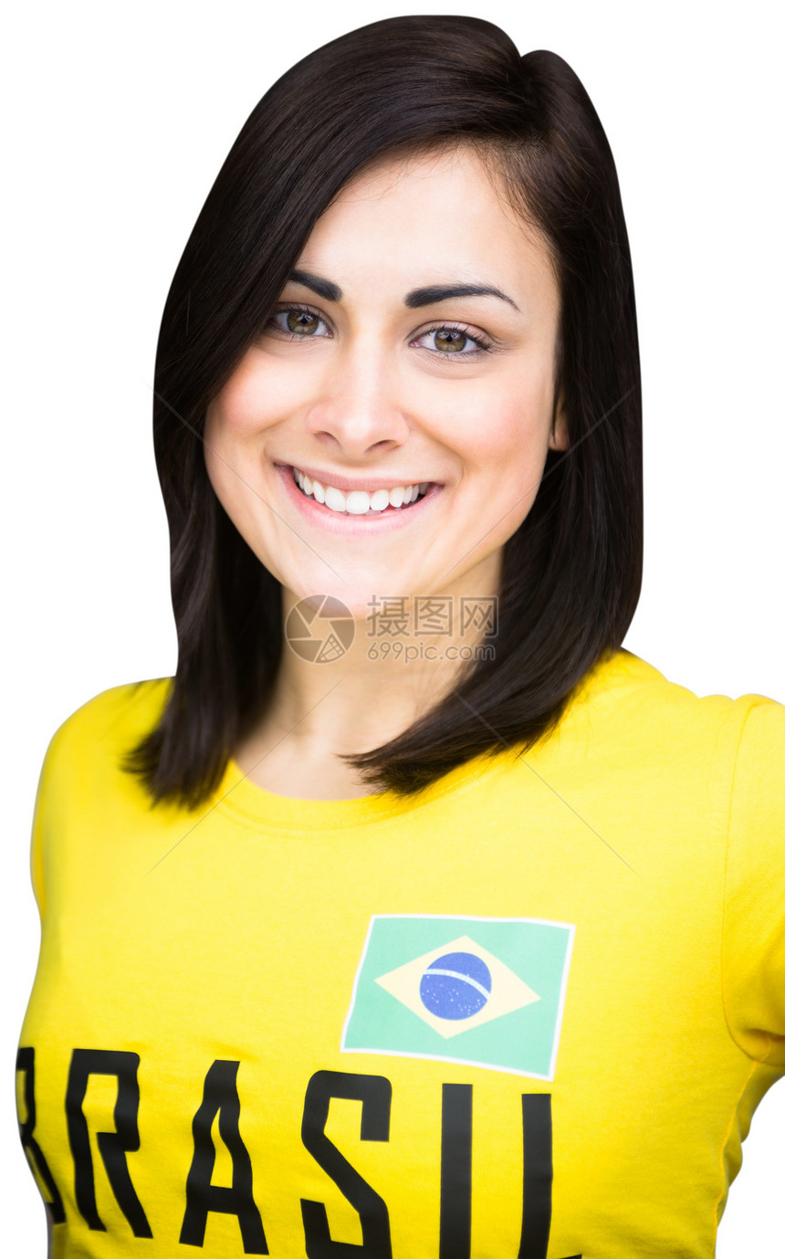 穿胸罩T恤的漂亮的足球球迷影棚黄色微笑绿色扇子女性活力运动女士观众图片