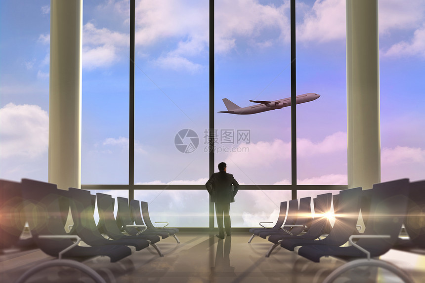 商务人士对臀部手的复合形象计算机套装商业座位出港飞机场双手飞机飞行职业图片