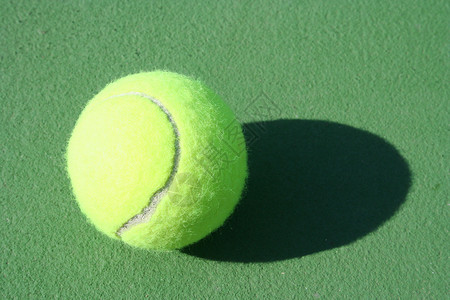 网球球运动黄色背景图片