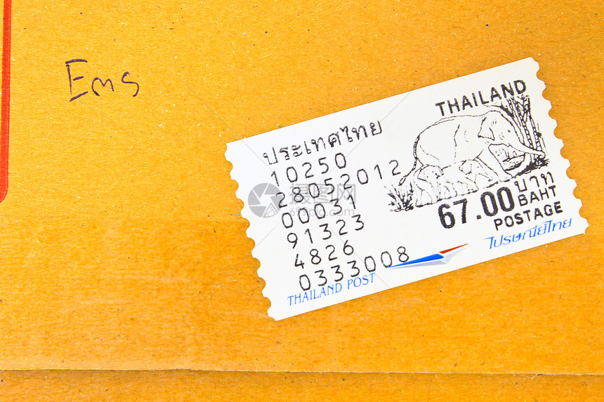 包裹上印章白色邮件黄色邮票棕色信封邮资邮政图片