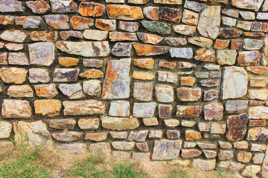 石墙圆形圆圈材料建筑学岩石建筑橙子建造安全石头图片