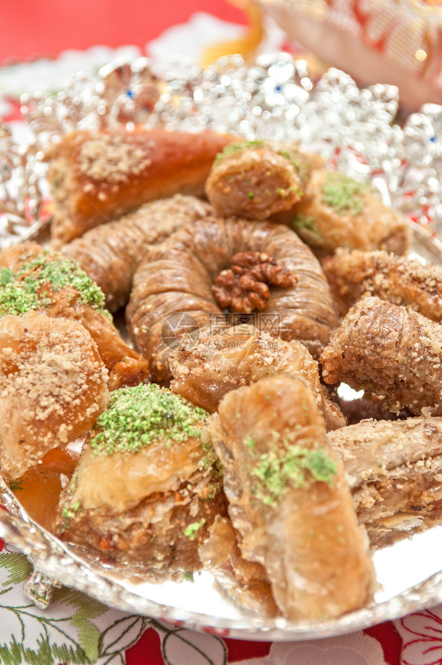 土耳其语甜点糖果火鸡咖啡店蜂蜜文化脚凳坚果面包盘子面团图片