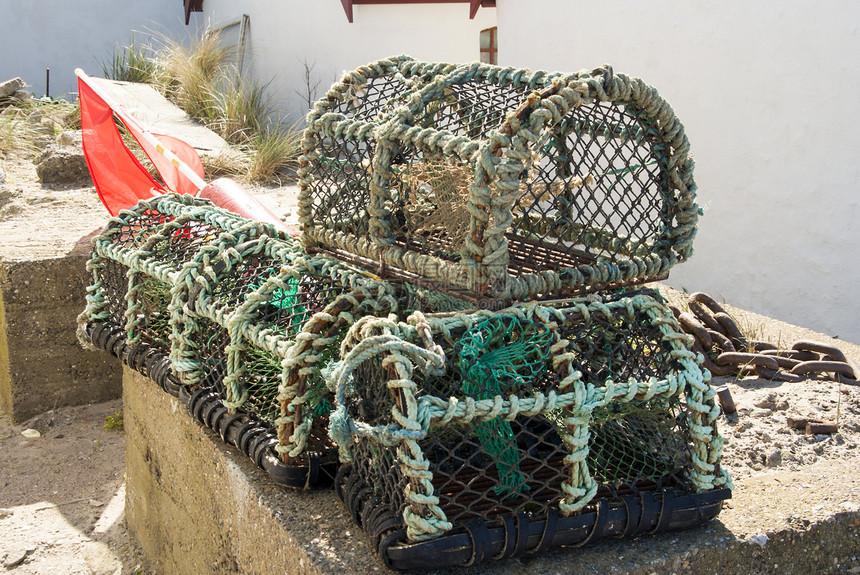 龙虾篮子鲵鱼游泳闲暇亚麻港口目的地旅行白鹤绳索码头图片
