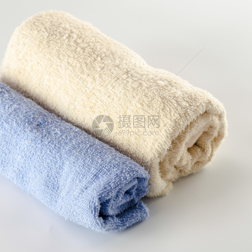 毛巾材料白色洗衣店折叠蓝色绿色酒店纺织品棉布海滩图片