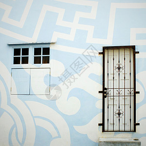 墙外涂漆的建筑物 门窗背景图片