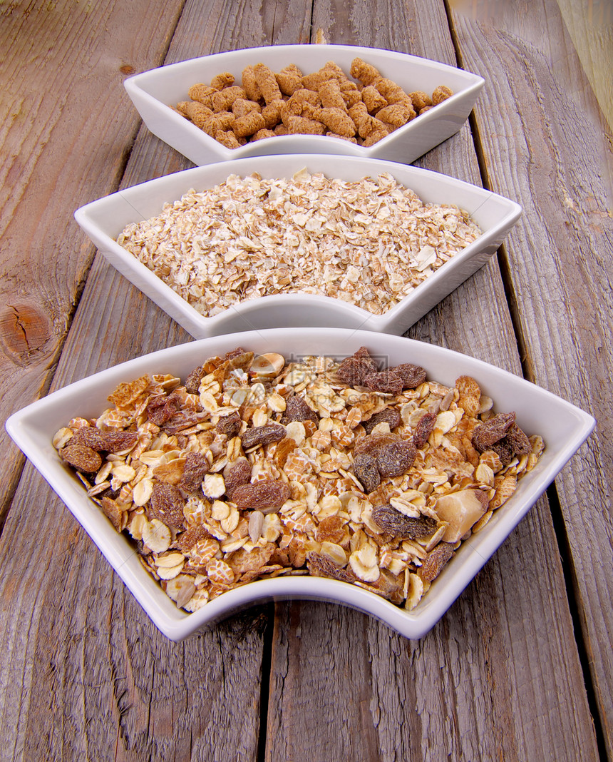 Muesli Oat Flakes和Bran小麦食品健康饮食燕麦金子玉米麦片素食者薄片饮食图片