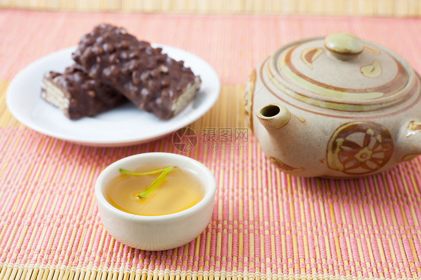 茶壶礼仪陶器绿茶木头饮料茶碗茶叶植物勺子图片