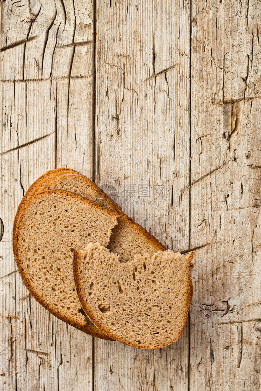 黑麦面包片燕麦小麦包子棕色圆形美食乡村营养宏观食物图片