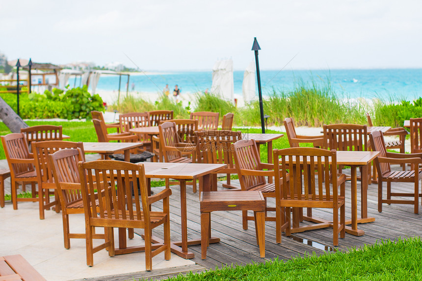 加勒比热带海滩的外门咖啡馆瓶子家具海景热带椅子木头咖啡屋假期宴会扶手椅图片