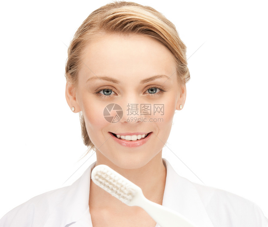 带牙刷的有吸引力的女医生女士保健牙科治疗搪瓷专家口腔科微笑牙疼牙医图片