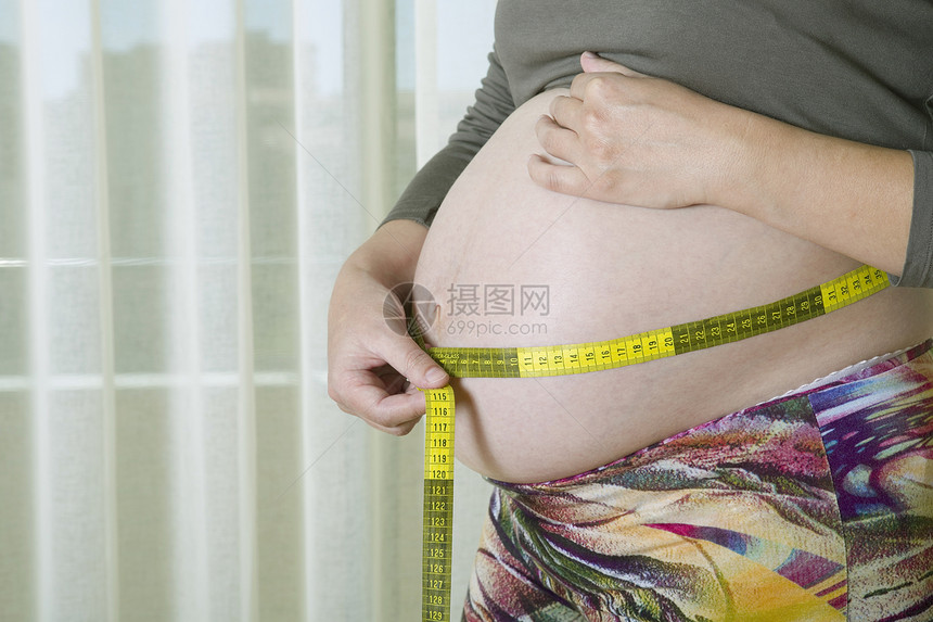怀孕母亲卫生白色女性生活希望腹部女士身体母性图片