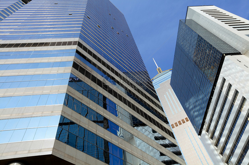 现代办公楼建筑学城市生活财富玻璃摩天大楼公司蓝色进程外观反射图片