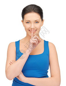 女人做一个静默的手势宝贝快乐微笑成人秘密女性蓝色手指阴谋女孩背景图片