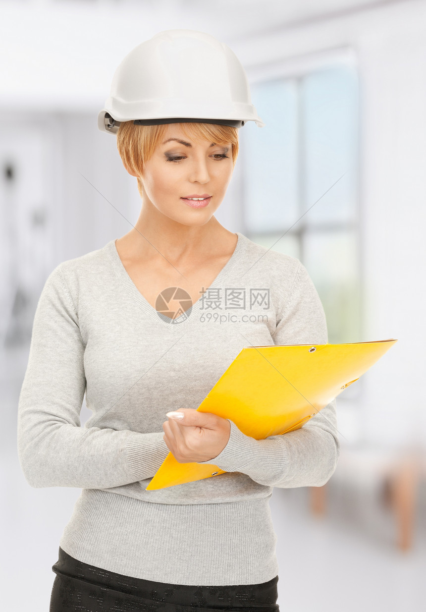 头盔内承包商中年建筑工作工程师女性建设者女士成人文件夹快乐图片