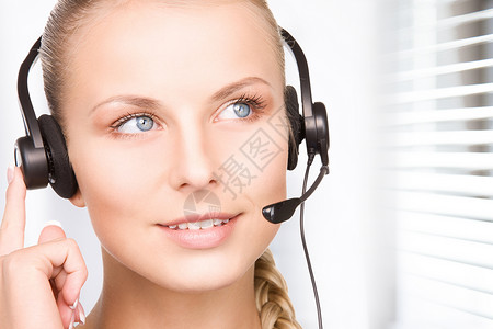 帮助热线商业操作员女性求助女孩顾问办公室耳机秘书服务漂亮的高清图片素材