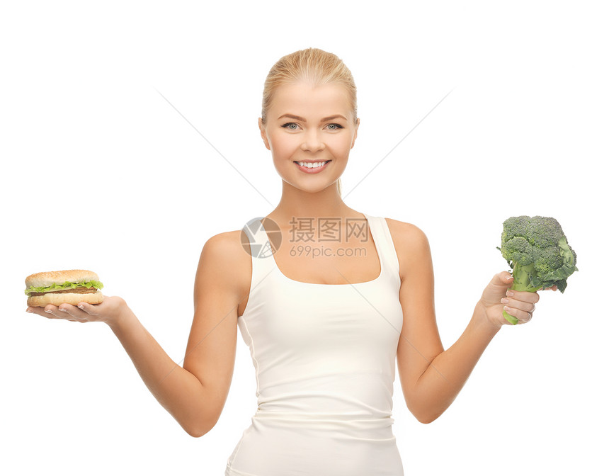 配有西兰花和汉堡包的妇女化合物困境重量数字减肥蔬菜食物身体饮食青菜图片