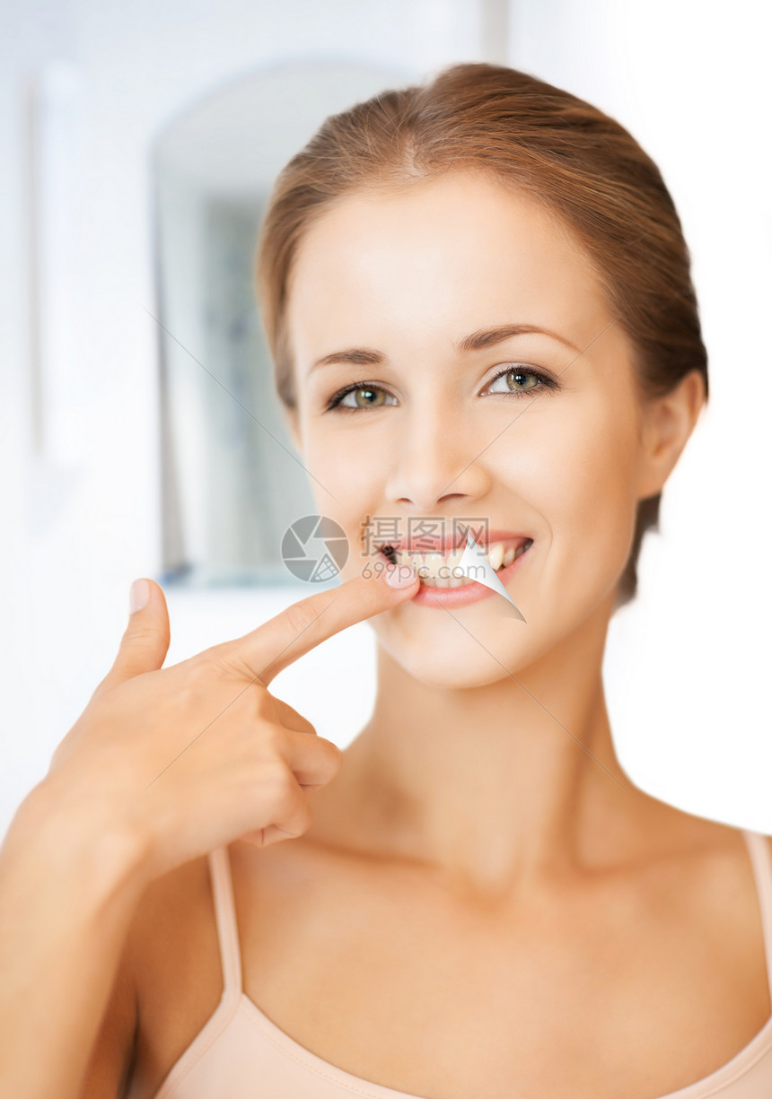 美丽美丽的妇女微笑牙齿卫生牙科女性口服青年活力女孩福利图片