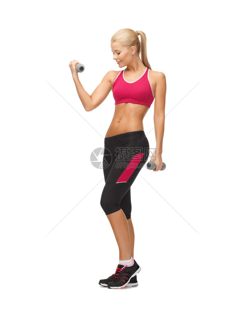 年轻运动女青年 有轻聋哑铃肌肉运动员减肥训练重量培训师女孩运动装教练身体图片