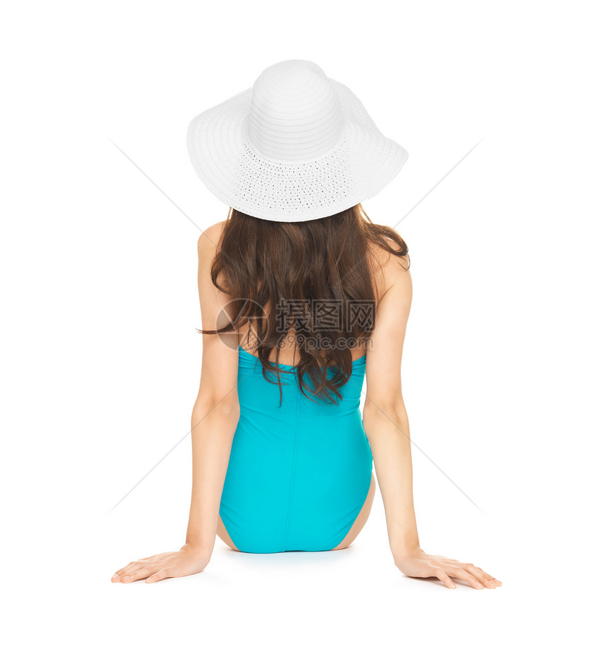 穿着戴帽子泳衣的模特黑发晒黑海滩蓝色女性身体头发比基尼闲暇皮肤图片
