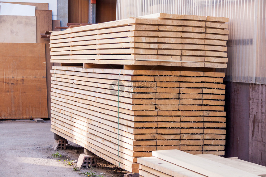 存放在仓库中的木制面板资源生产销售量店铺硬件工业建造商业库存工厂图片