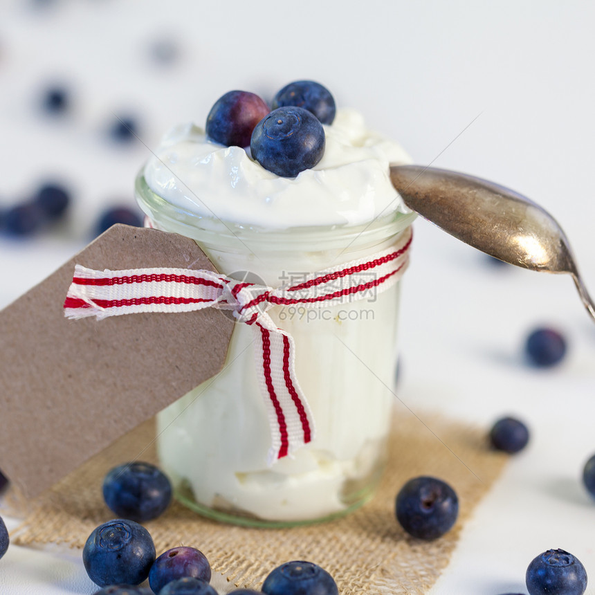 酸凝胶奶油或酸奶加蓝莓饮食生物国家产品奶制品甜点烹饪丝带礼物奶油图片