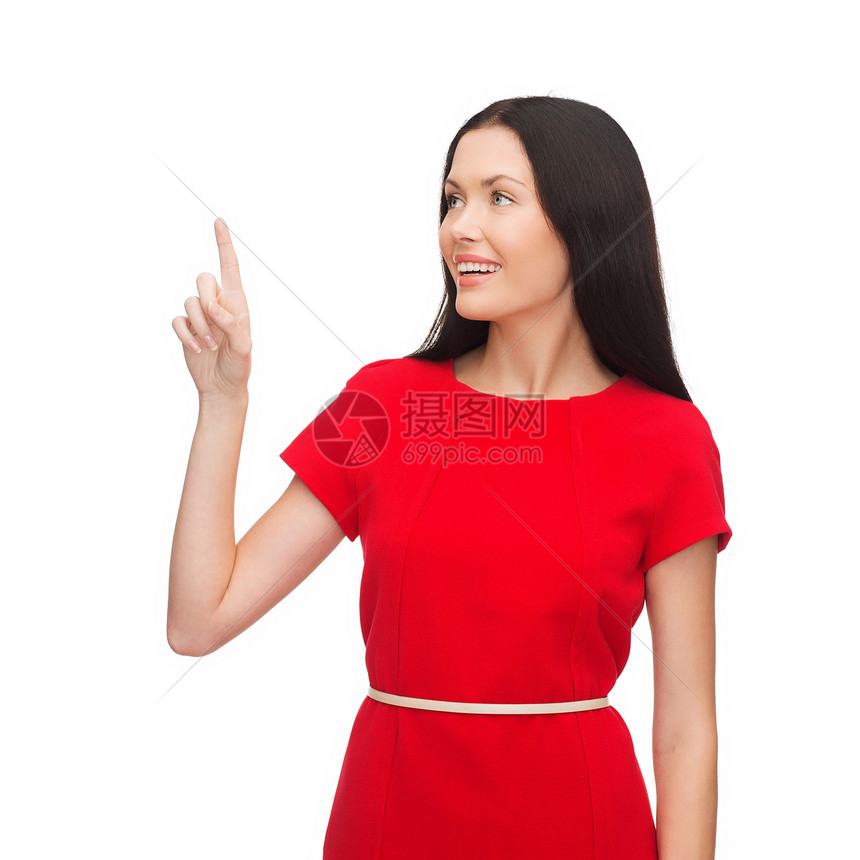 穿红裙子的年轻姑娘用手指指着她的手指红色微笑广告按钮女孩采摘幸福指挥快乐白色图片