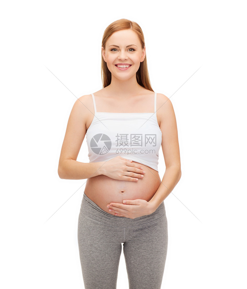 未来幸福的母亲抚摸她的肚子女孩男生腹部父母身体生活母性女士家庭孩子图片