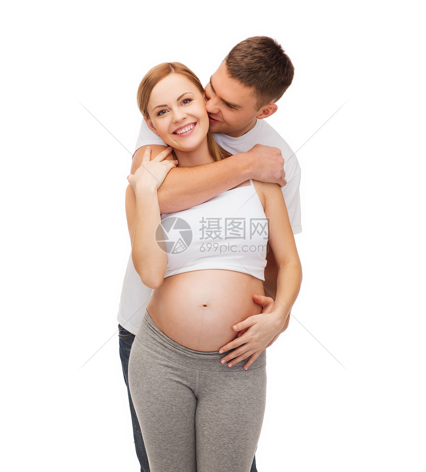 幸福的年轻家庭预产期子女父亲母性身体男人女士生活妻子肚子怀孕女性图片