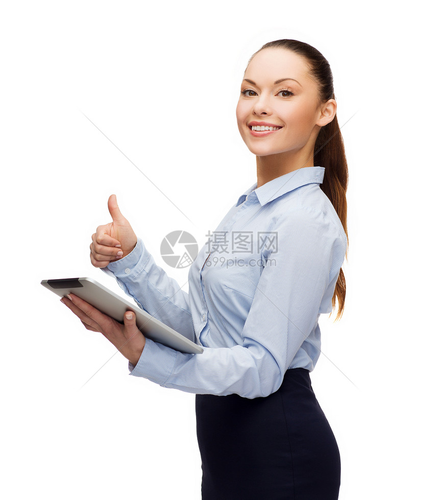 看着平板电脑的微笑着的女人互联网屏幕人士手势技术展示办公室商业上网快乐图片