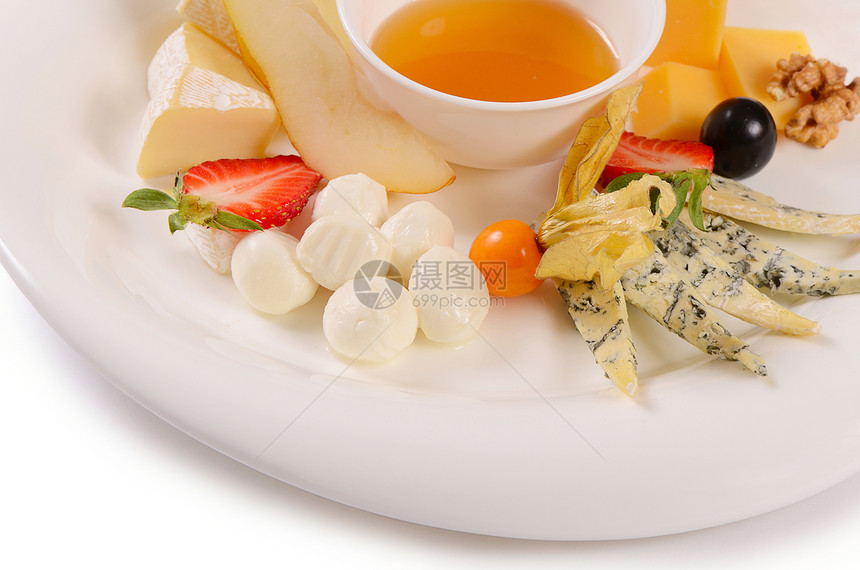 配蜂蜜的各类奶酪蓝色熟食美食小吃羊乳奶制品早餐干酪蜂蜜盘子图片