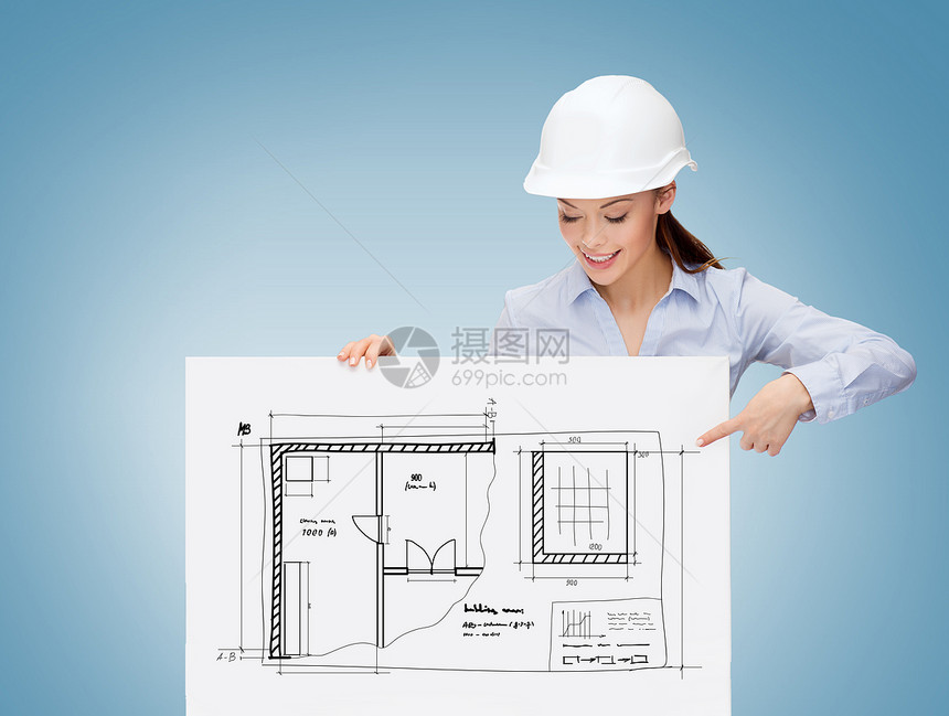 戴头盔的女商务人士用手指对着板女性商务成人财产木板建筑师拉丁草图绘画建筑图片
