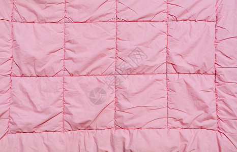 毯子织物寝具被子绗缝粉色背景图片