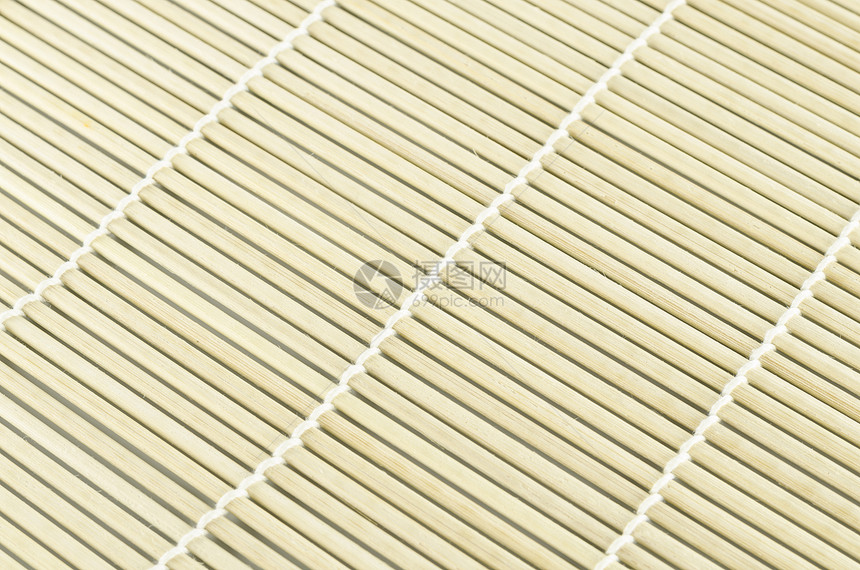 寿司垫优雅木头软垫滚动棕色条纹文化黄色白色厨房图片