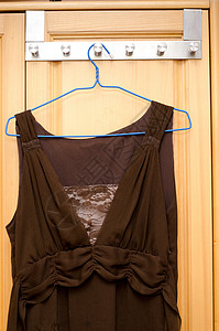 着装雪纺女性棕色衣柜蕾丝布料衣服背景图片