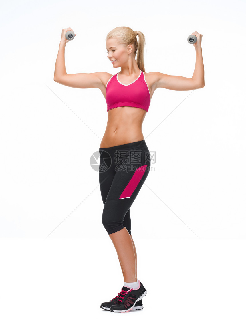 年轻运动女青年 有轻聋哑铃肌肉运动装减肥耐力教练身体健身房数字女孩训练图片