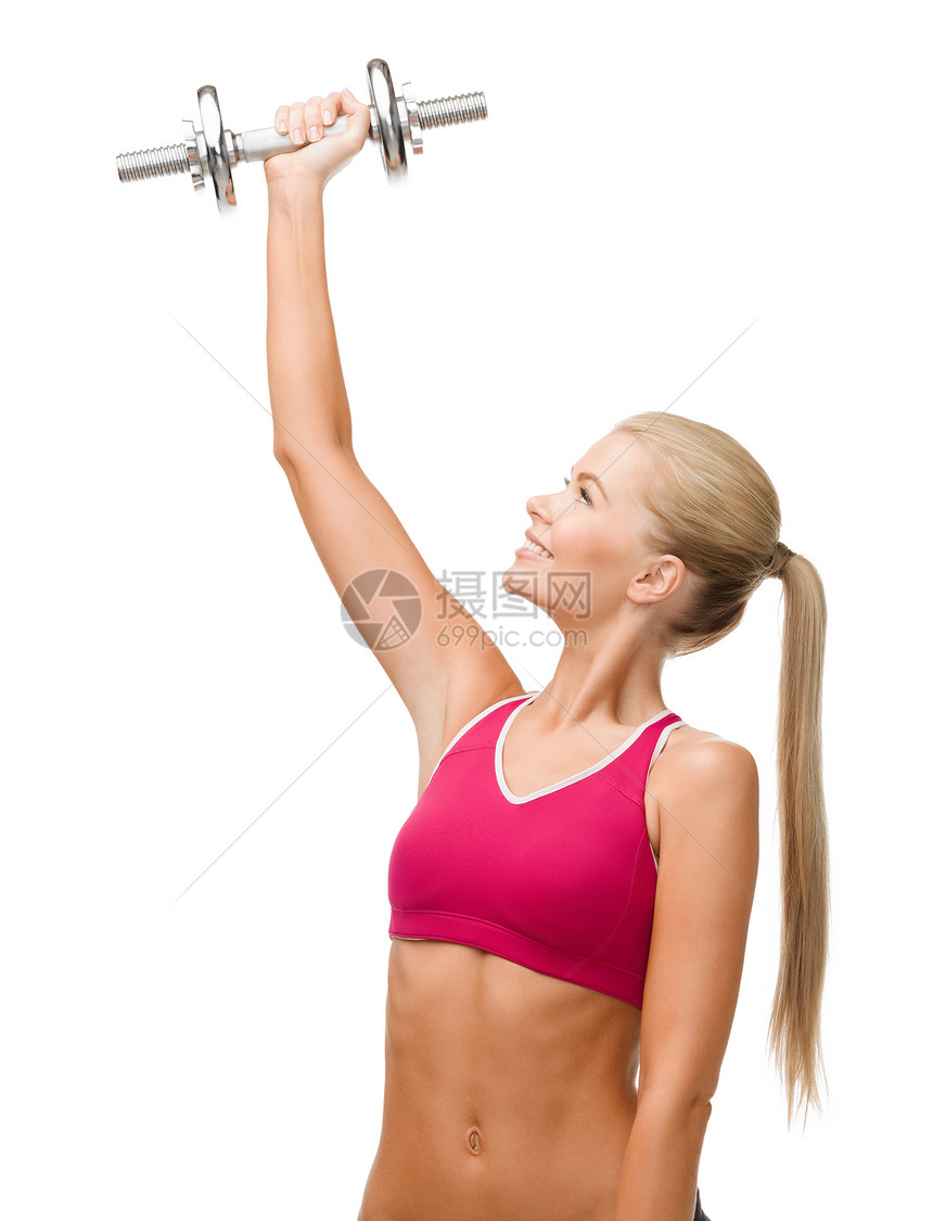 带着重钢的哑巴微笑的女人减肥手臂肌肉运动运动装哑铃损失力量女孩运动员图片