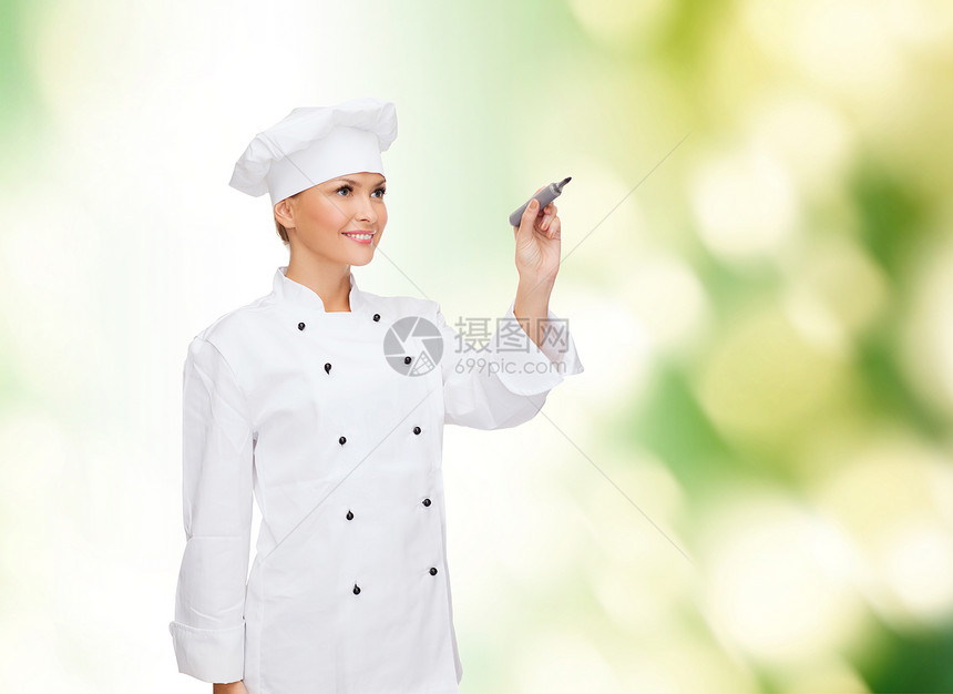 微笑的女厨师在空气中写作绘画生态女孩美食餐厅女性食谱工人服务酒店图片