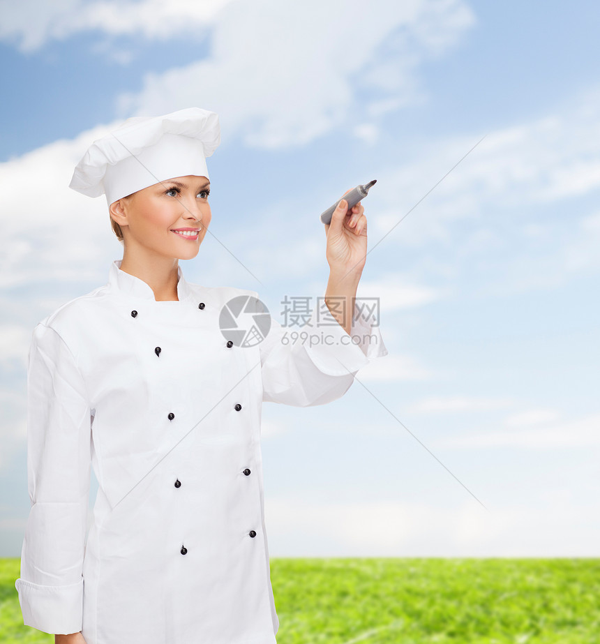 微笑的女厨师在空气中写作成人女性天空食谱美食绘画职业管理人员工人屏幕图片