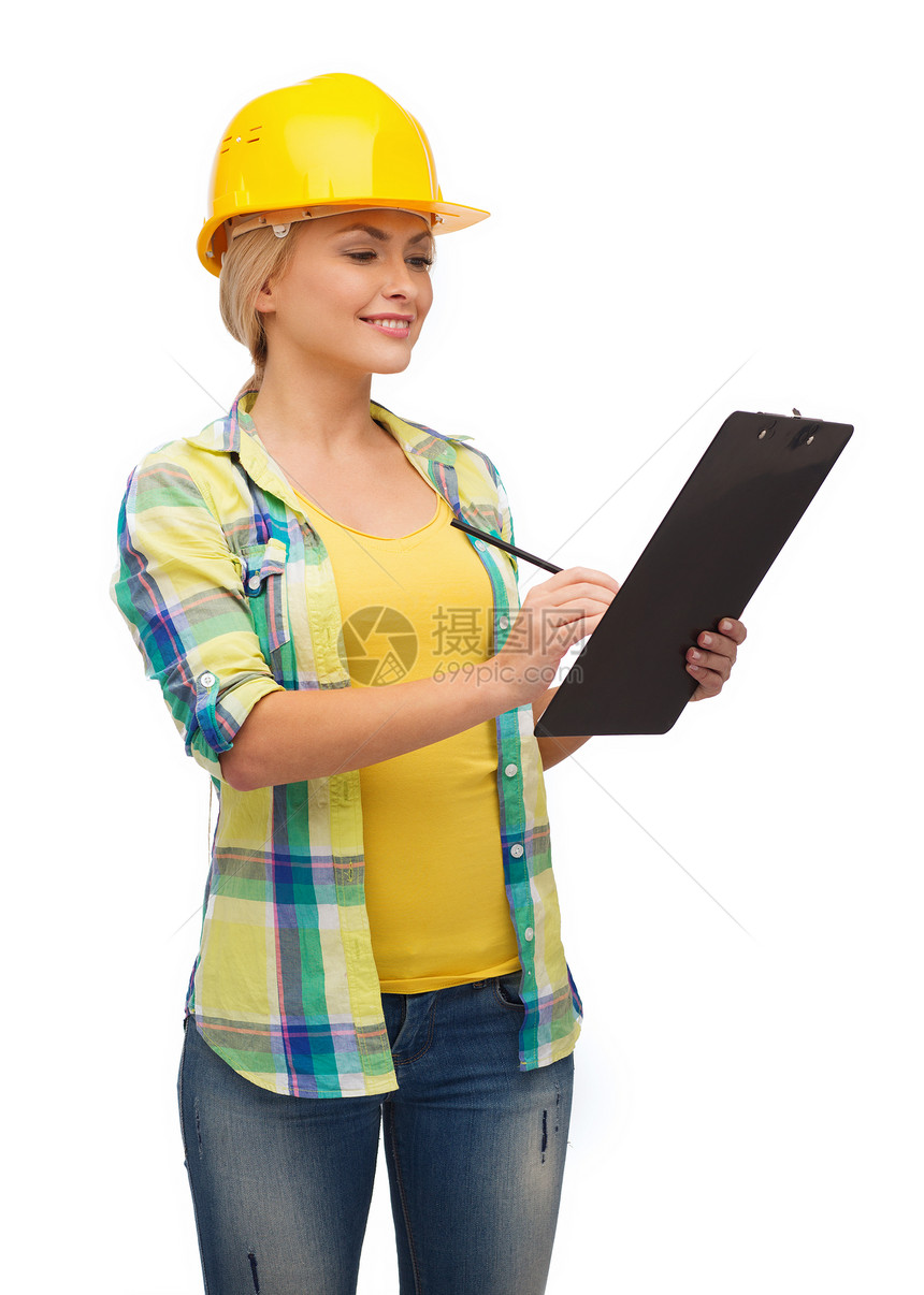 带着剪贴板戴头盔的笑着女人硬装乐器承包商维修建筑笔记工人专家建设者职业图片
