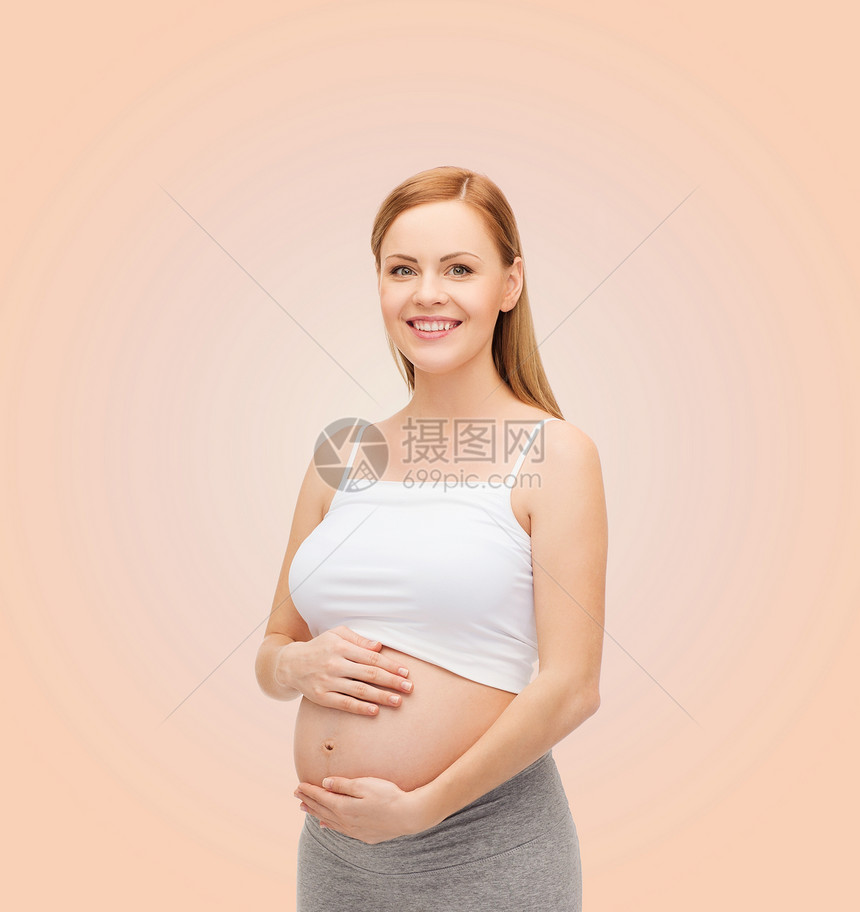 未来幸福的母亲抚摸她的肚子孩子怀孕腹部家庭母性女性生活婴儿女士父母图片