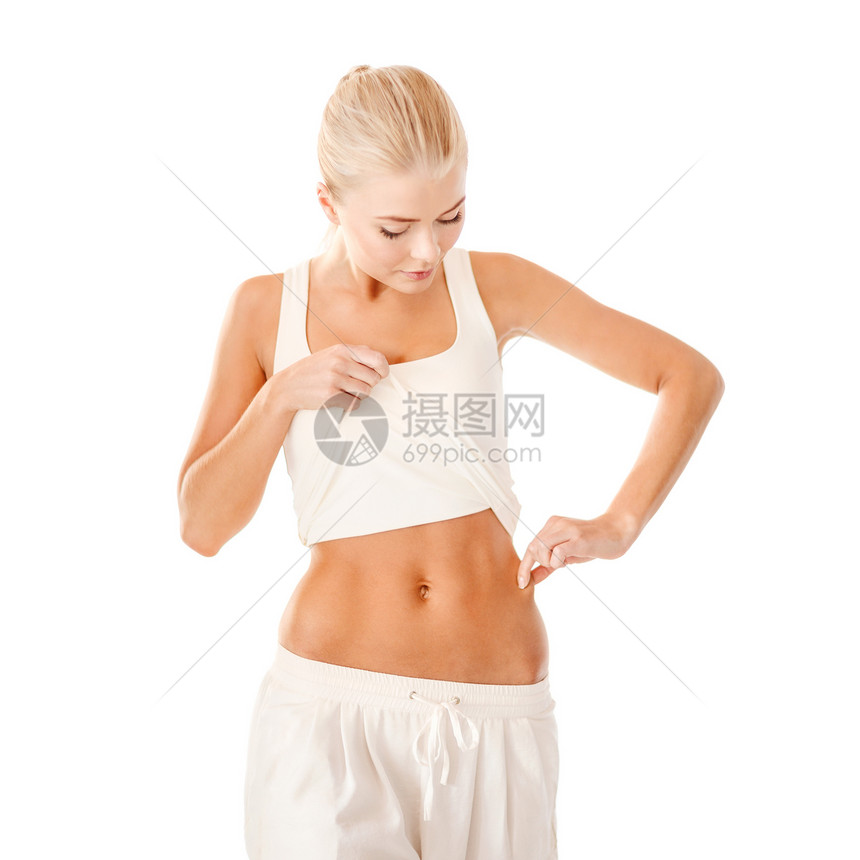 测量腰部脂肪含量的合适妇女图片